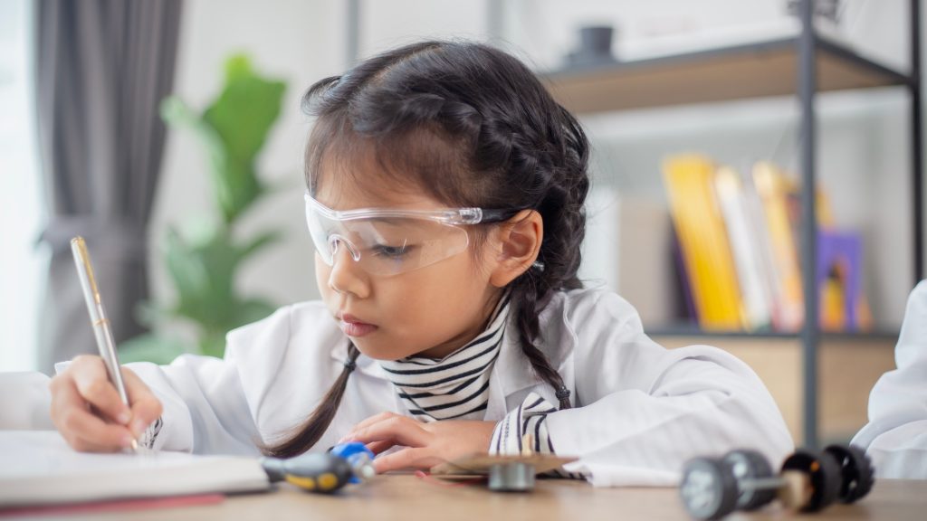 Asian students learn at home in coding robot cars and electronic board cables in STEM, STEAM,