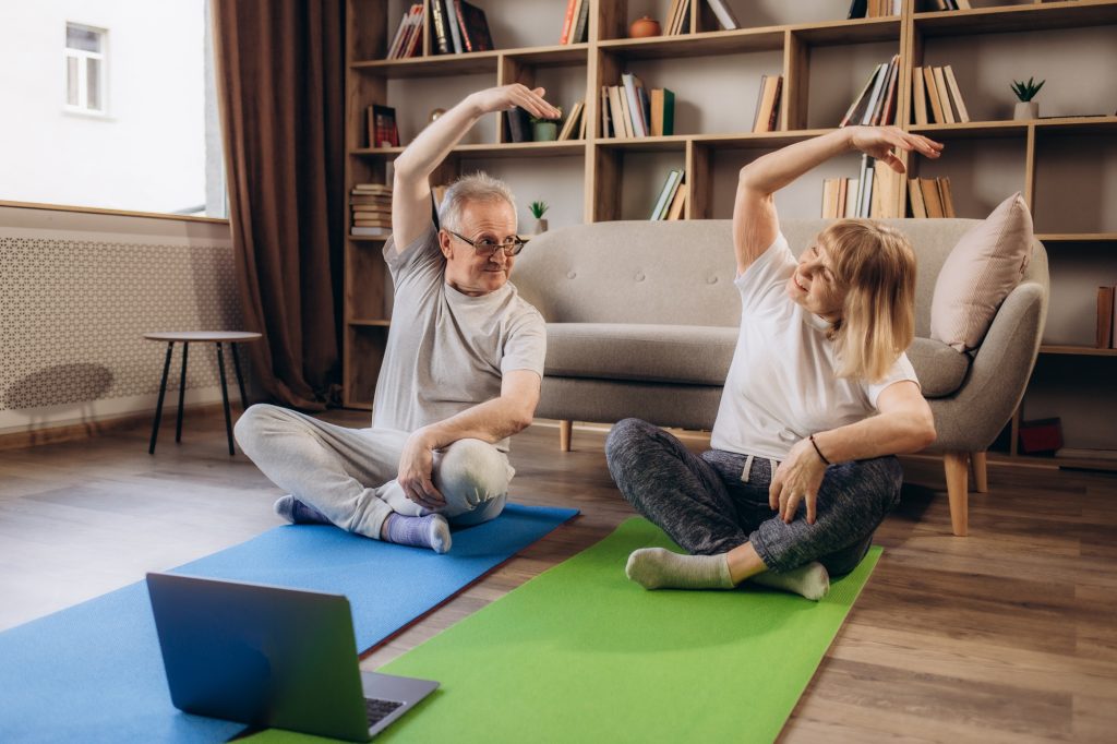 Meditation, senior couple and tutorial exercise for workout, training and health for wellness