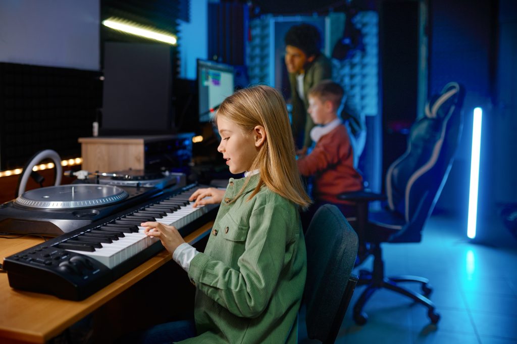 School children at sound record studio